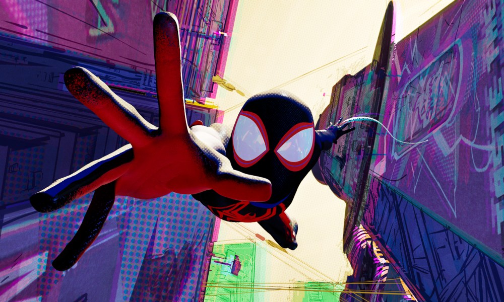 Miles Morales falls in between two buildings in Spider-Man: Across the Spider-Verse.