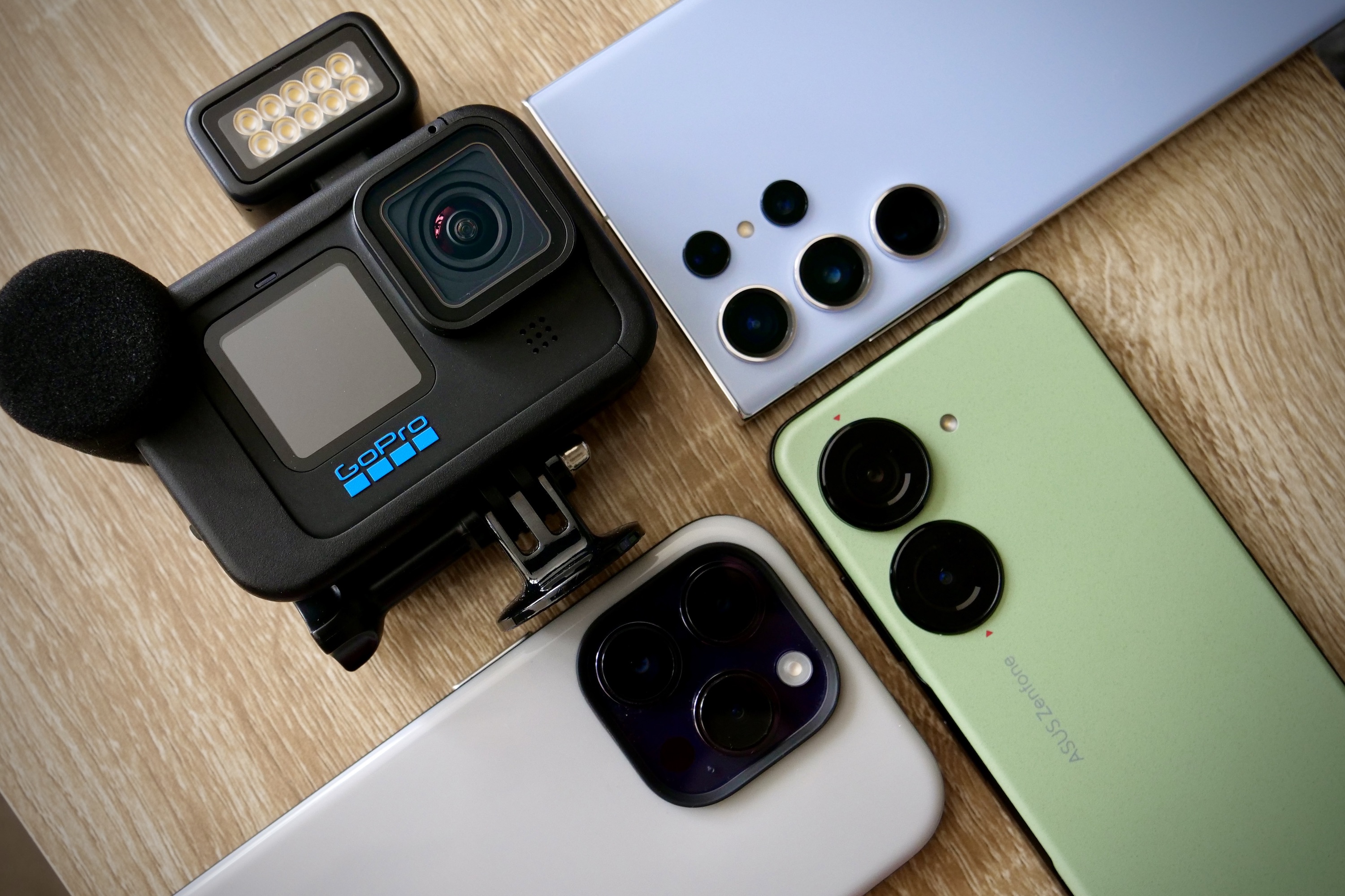 The Asus Zenfone 10, along with the Samsung Galaxy S23 Ultra, Apple iPhone 14 Pro, and the GoPro Hero 11 Black.