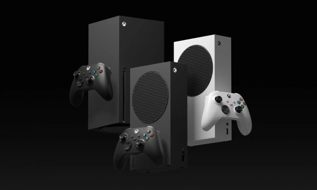 An Xbox Series X sits next to both Series S models.
