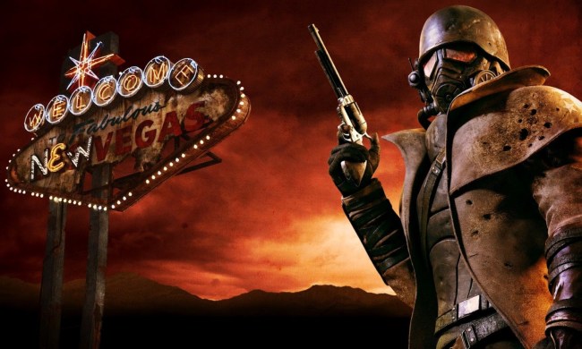 The courier holding a gun with a welcome sign in the background in Fallout: New Vegas key art.