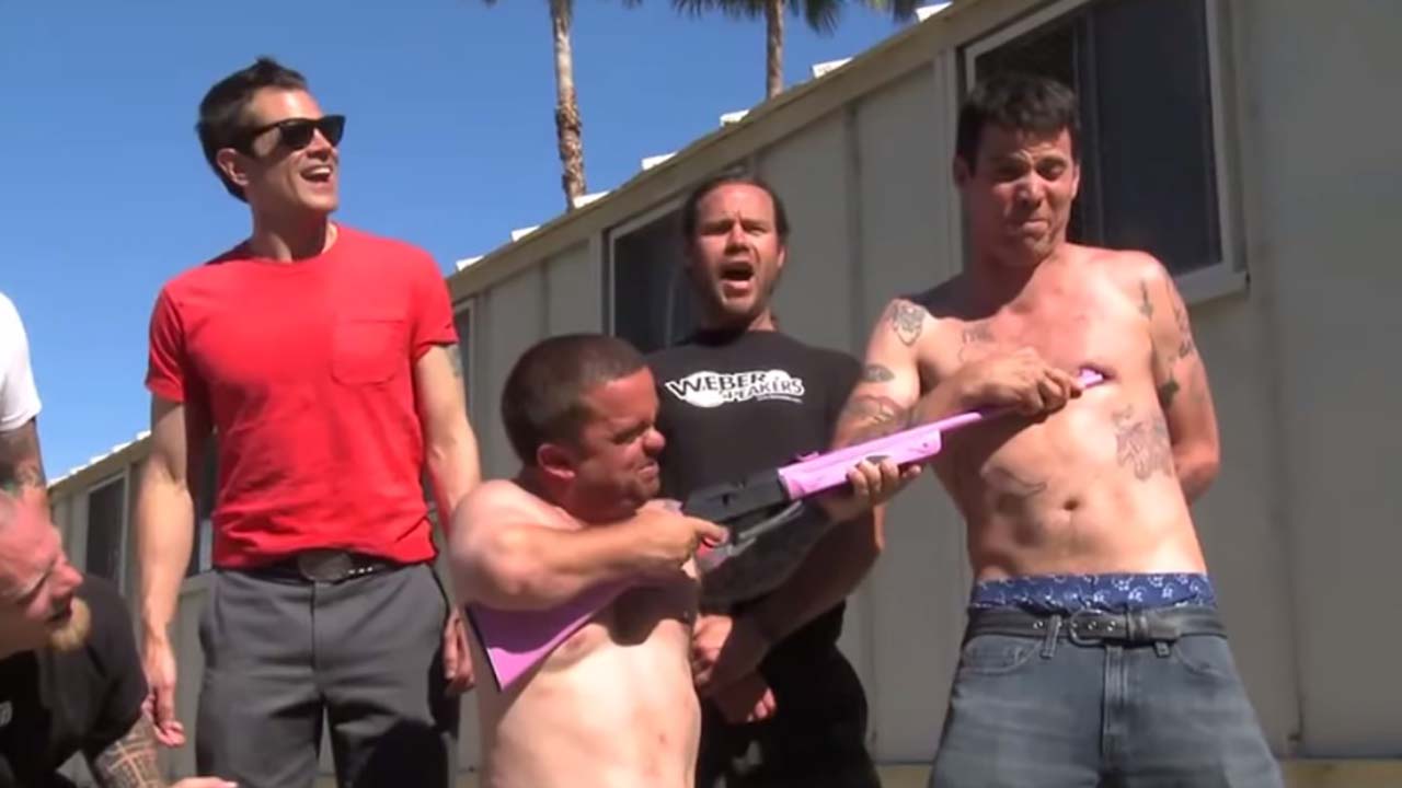 The cast of Jackass doing a stunt in a scene from the show.