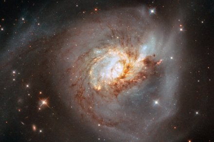 One galaxy, two views: see a comparison of images from Hubble and Webb