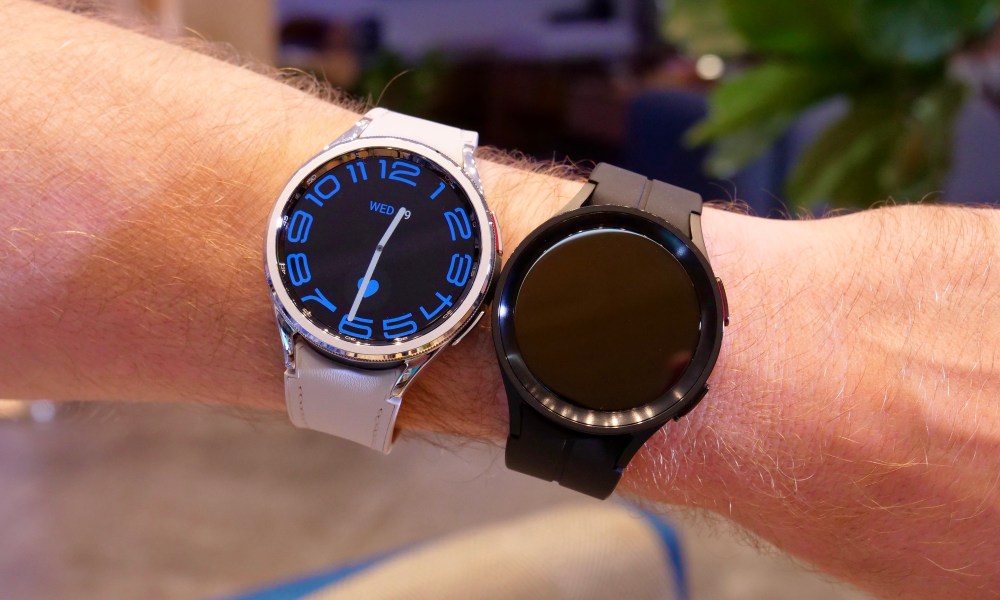 The Samsung Galaxy Watch 6 Classic and Galaxy Watch 5 Pro, side by side on a persons wrist.