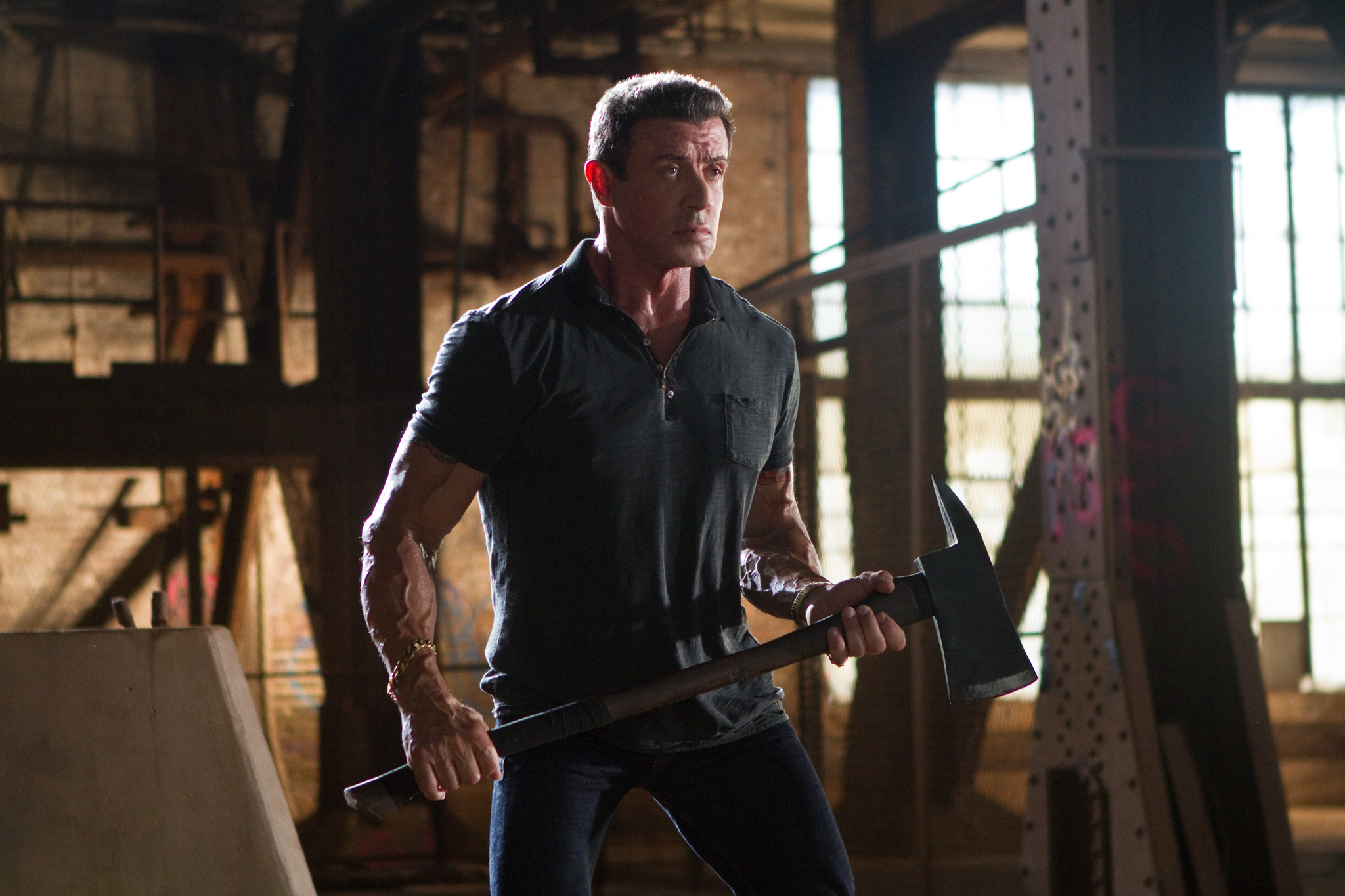 Sylvester Stallone holds an axe in Bullet to the Head.