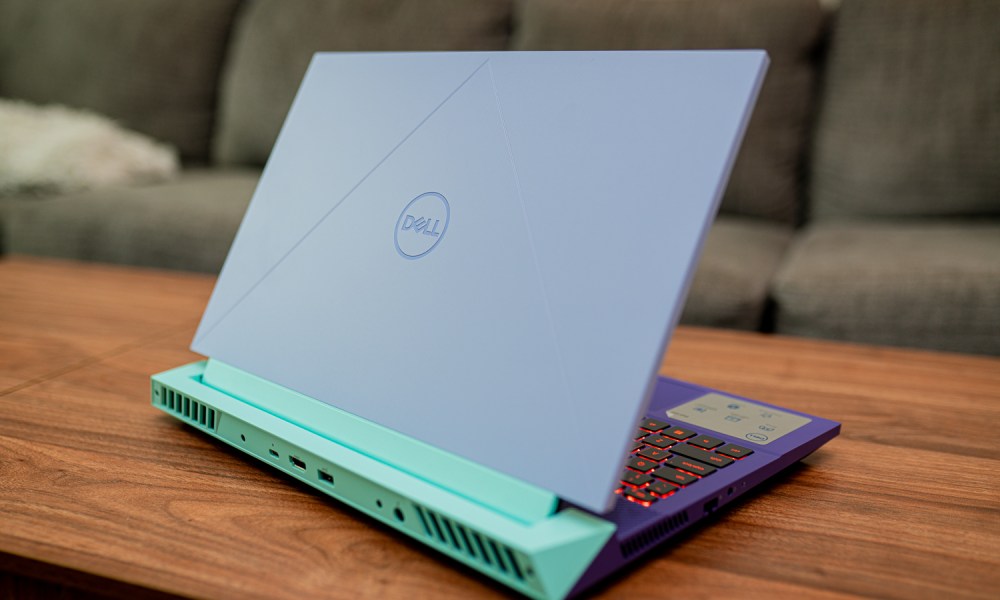 Dell G15 (2023) sitting on a coffee table.