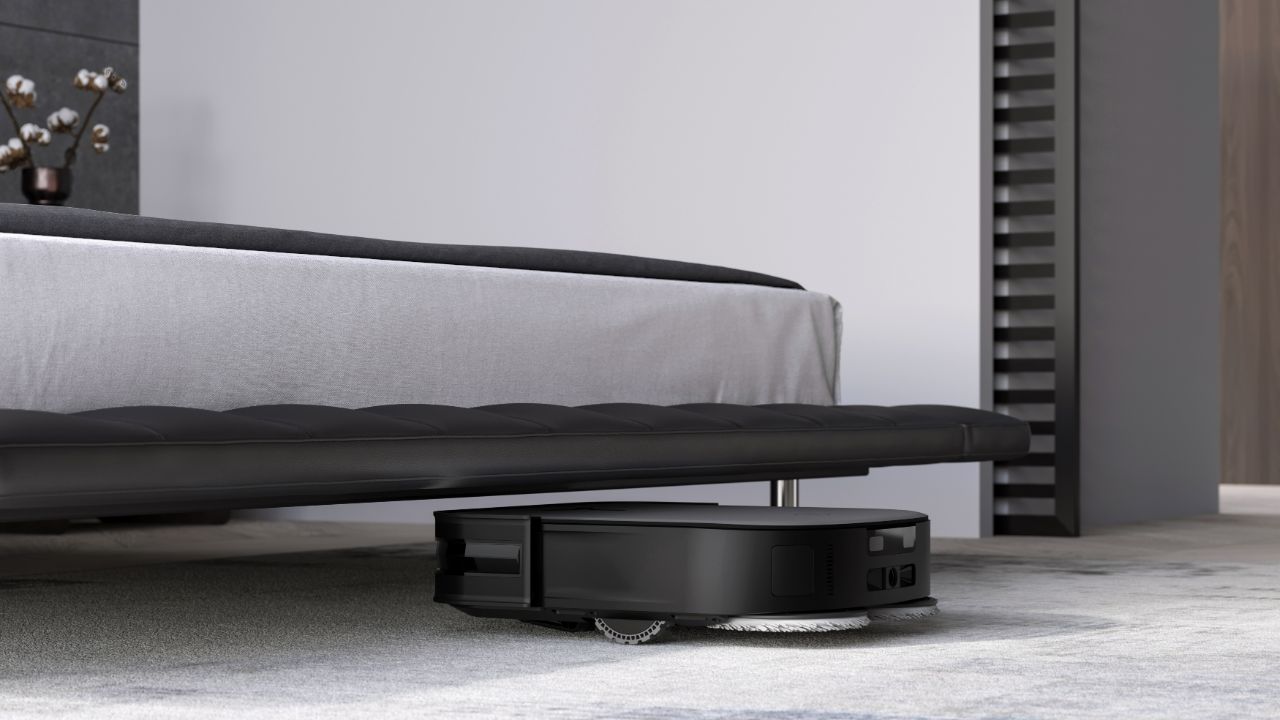 The X2 Omni clenaing under a bed.
