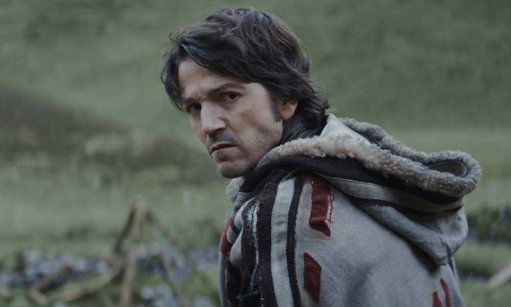 Cassian stands by a hillside in Andor season 1.