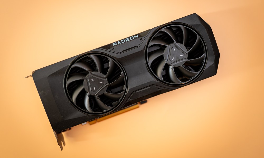 AMD RX 7800 XT graphics card on an orange background.