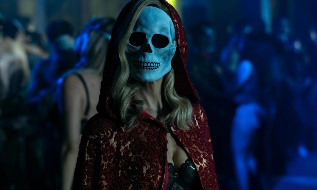 A blonde-haired woman wears a skull mask in "The Fall of the House of Usher."