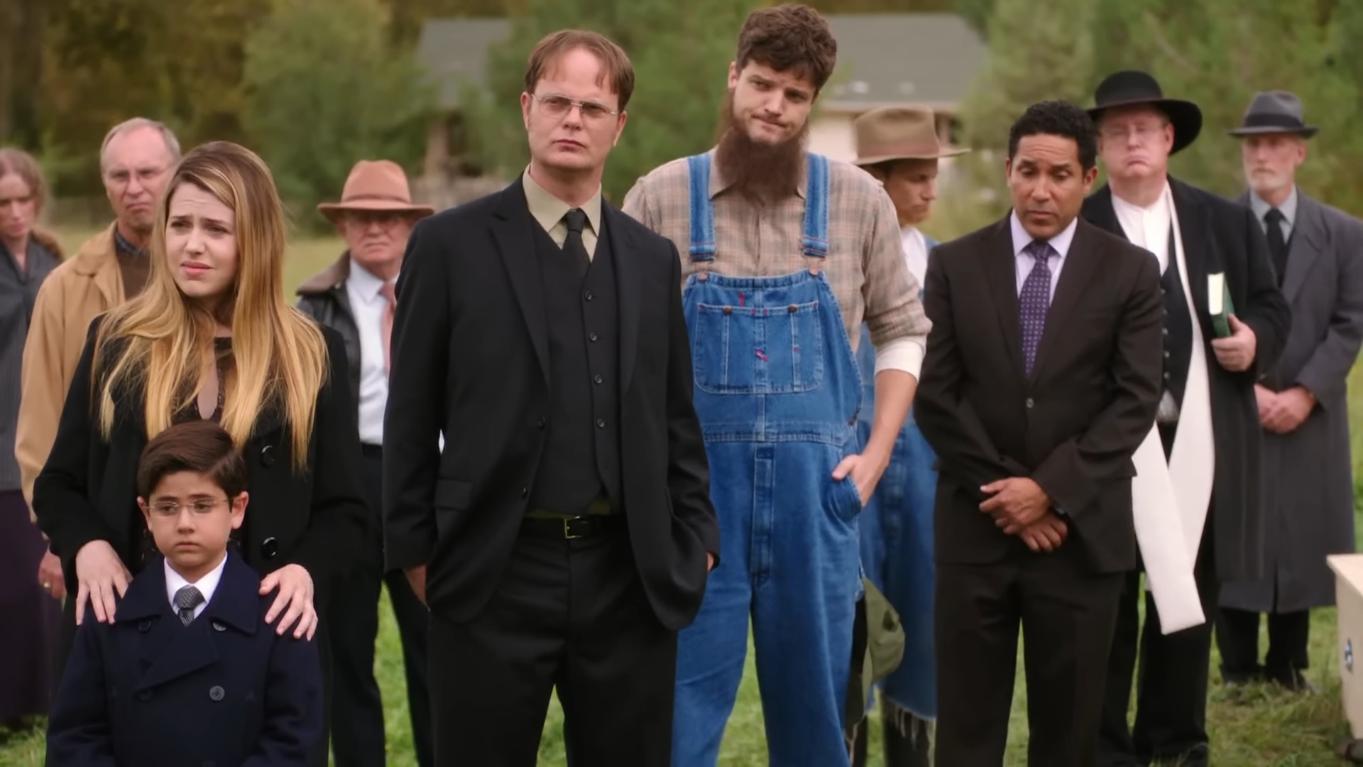 Oscar, Dwight and the Schrute family at a funeral in "The Office."