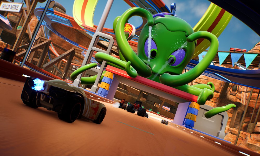 The player drives toward an octopus boss in Hot Wheels Unleashed 2.