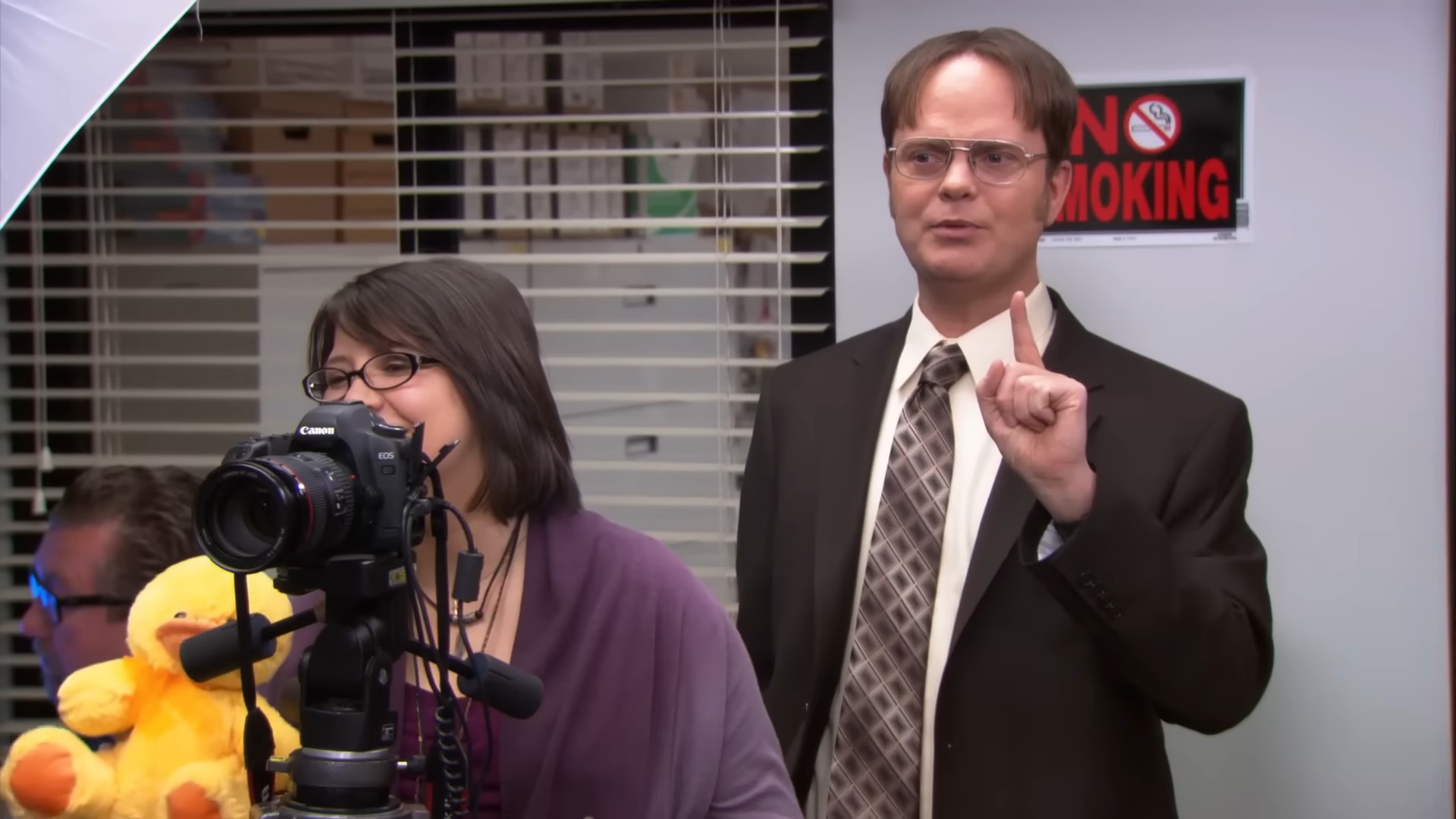 Dwight and a female photographer in "The Office."