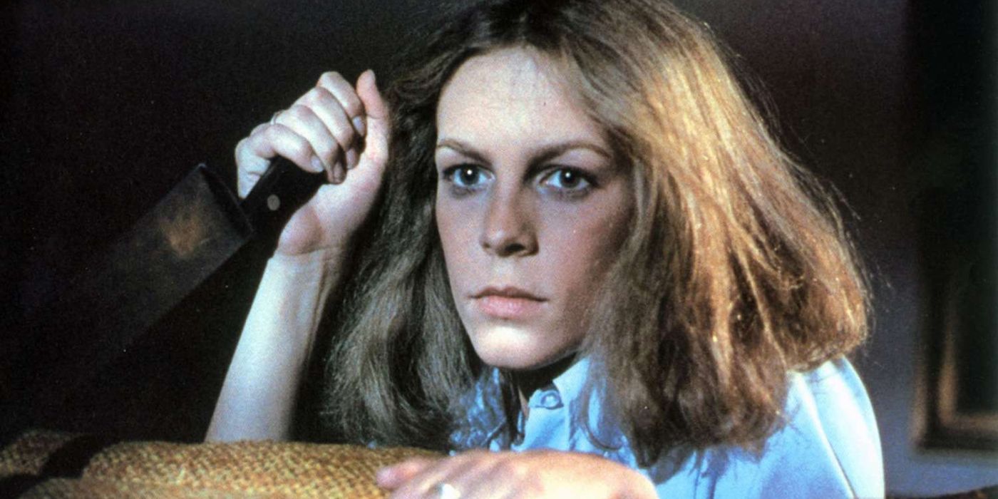 Jamie Lee Curtis holds a knife in Halloween