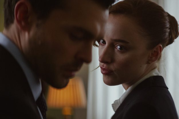 Phoebe Dynevor looks at Alden Ehrenreich in Fair Play.