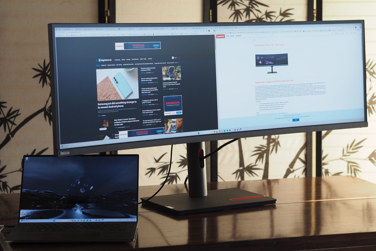 Lenovo ThinkVision P49w-30 monitor front angled view showing screen and stand.
