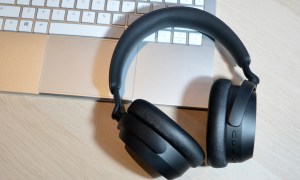 Sennheiser Accentum Wireless headphones sitting on laptop keyboard.