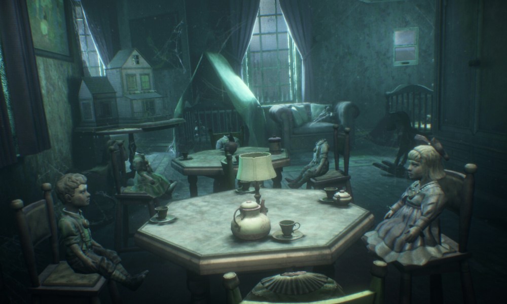 Dolls sit at a table in The 7th Guest VR.