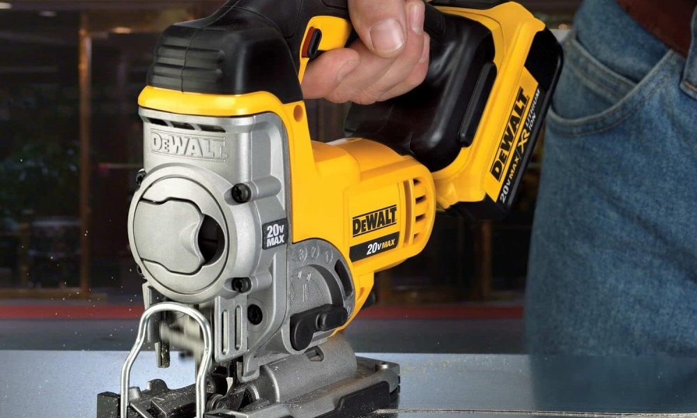 A man using a 20V DeWalt Jigsaw.