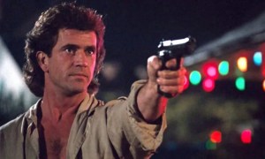 A man aims his gun in Lethal Weapon.