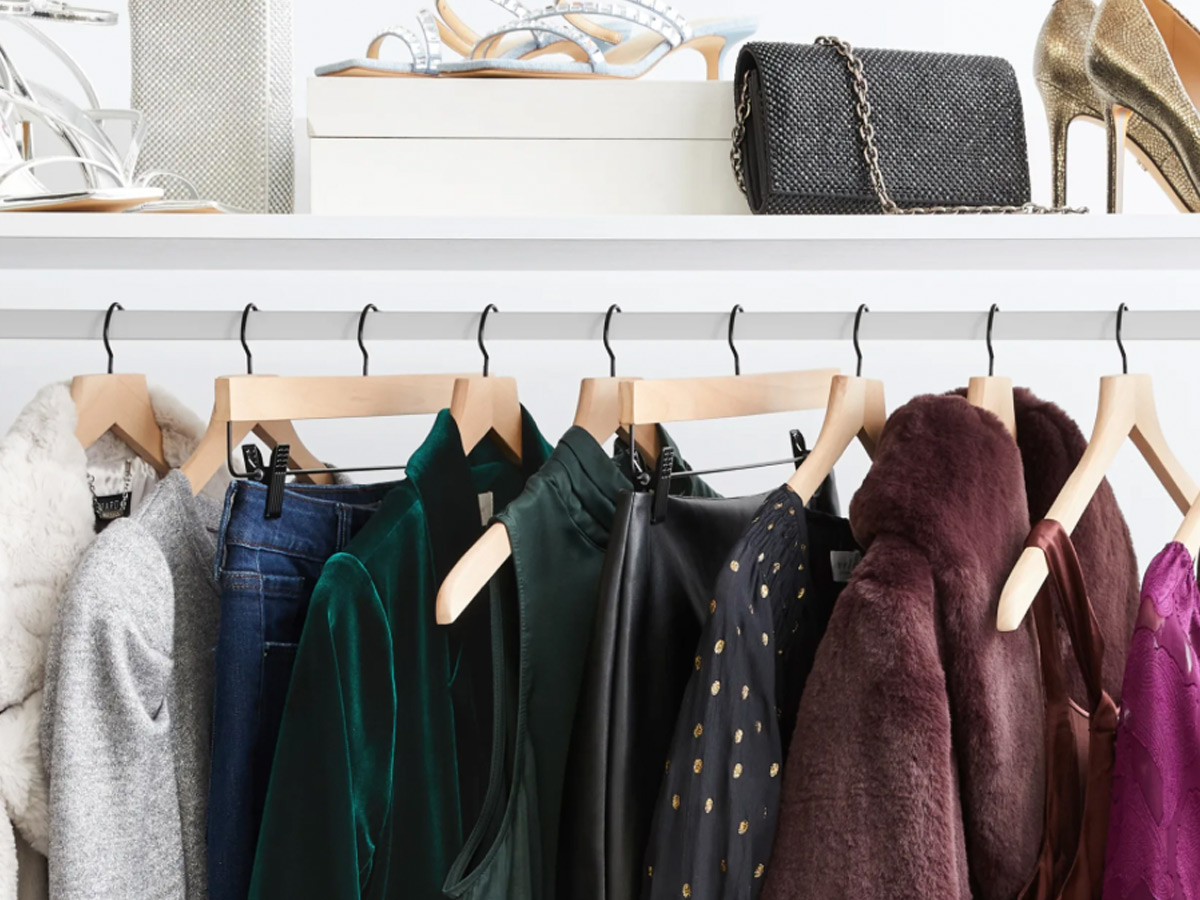 Clothes hanging in a closet.