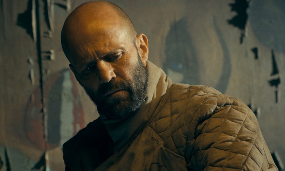 Jason Statham broods in a still from The Beekeeper