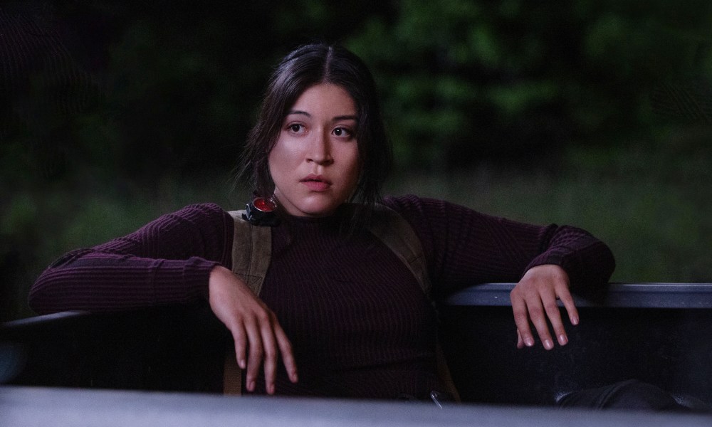 Maya Lopez sits in the back of a truck in Echo.