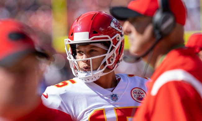 Patrick Mahomes of the Kansas City Chiefs stares from the sideline.