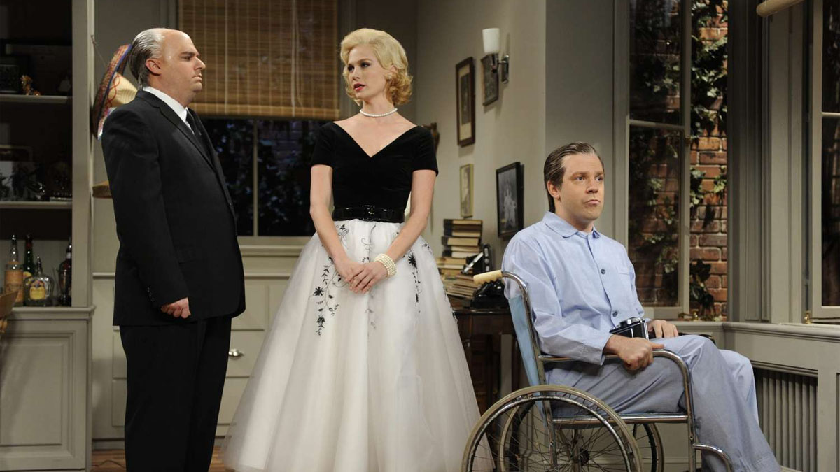 Bobby Moynihan, January Jones e Jason Sudeikis em Janela Indiscreta.