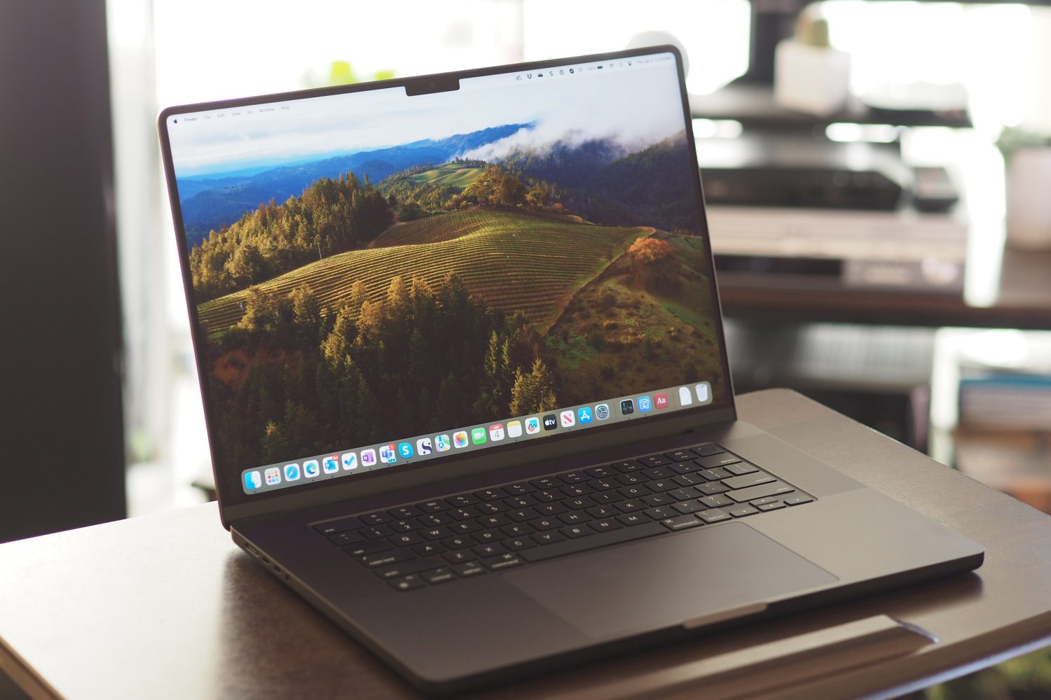 Apple MacBook Pro 16 front angled view showing display and keyboard.