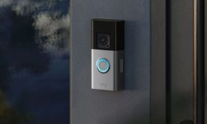 The Ring Battery Doorbell Pro installed near a door.