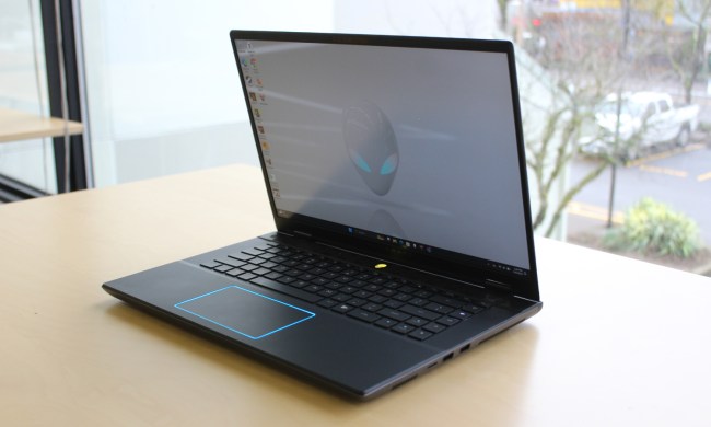 The Alienware m16 R2 on a table in front of a window.