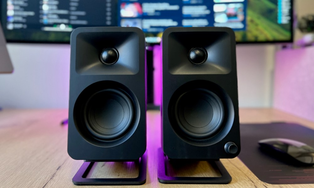 The Kanto Ora Reference Desktop Speakers on a desk.