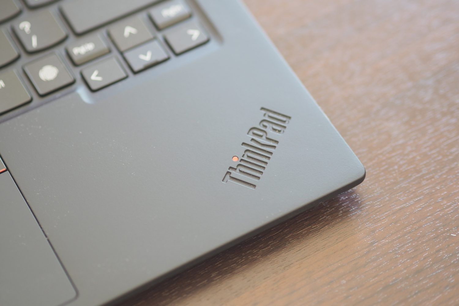 Lenovo ThinkPad X1 Carbon Gen 12 top down view showing logo.