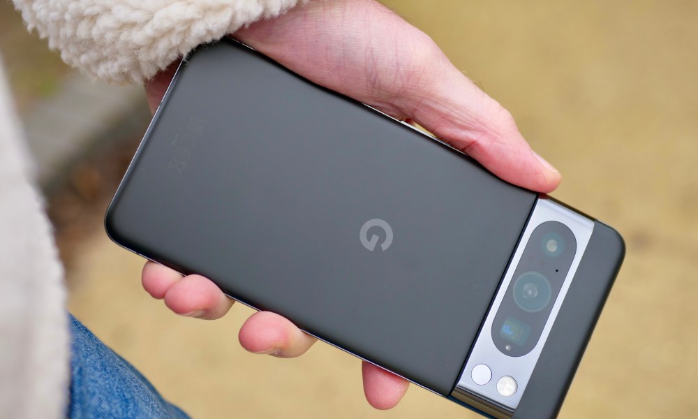 A person holding the Google Pixel 8 Pro.