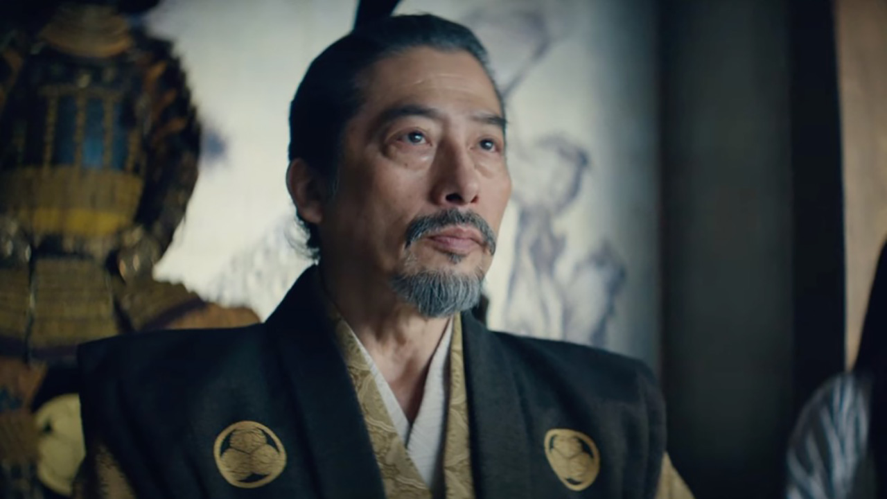 A samurai man looking serious in a scene from Shogun.