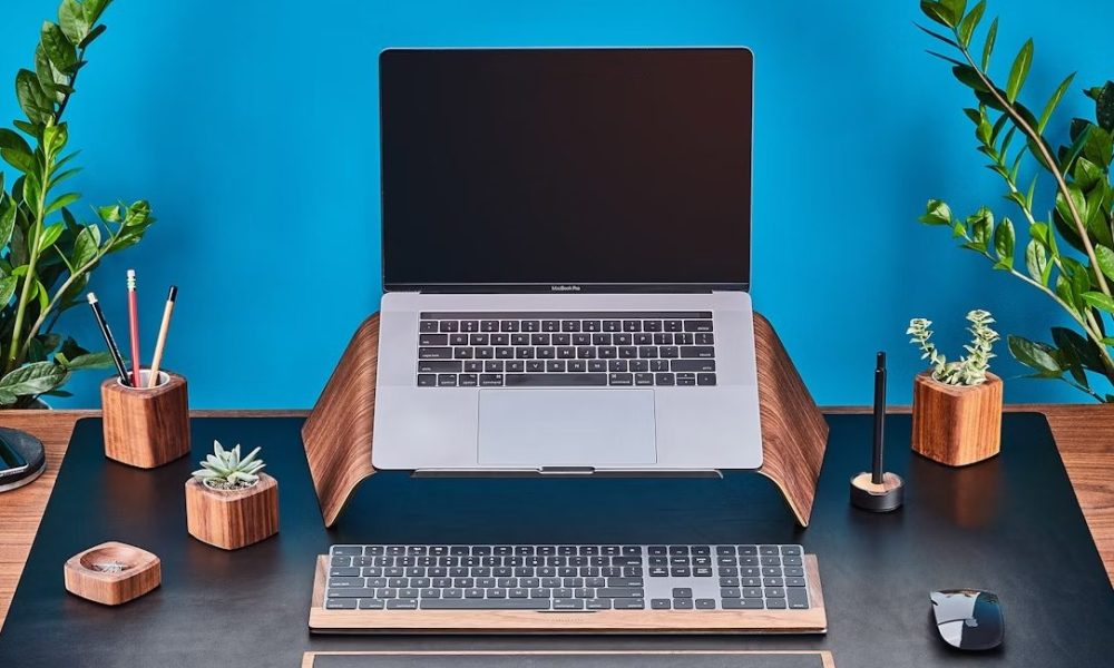 The Grovemade Wood Laptop Stand with other Grovemade desk supplies.