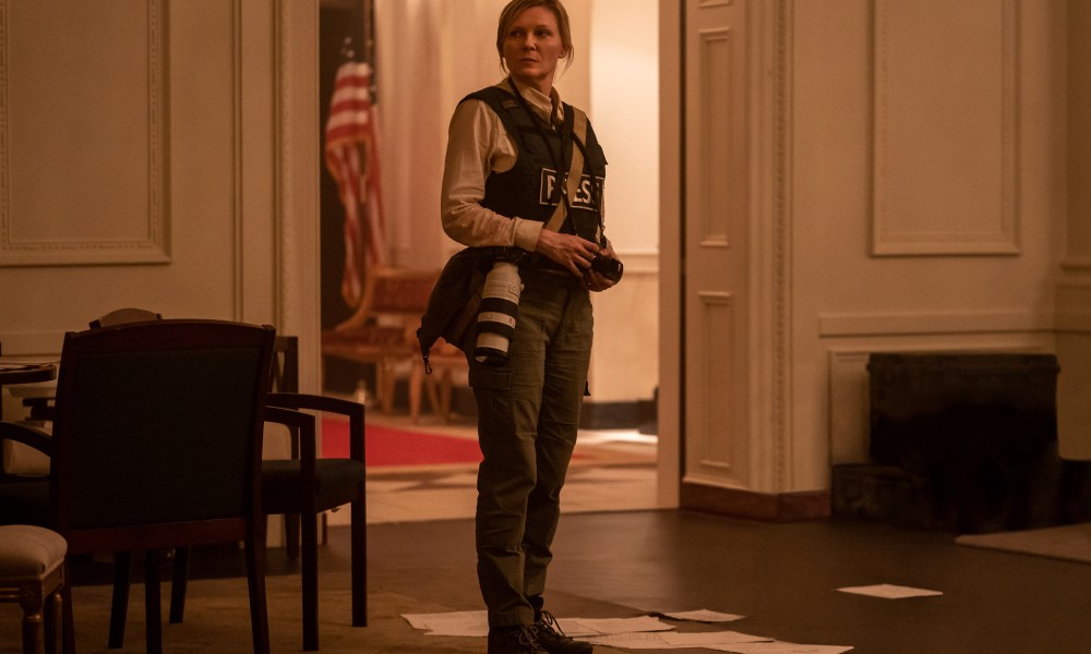 Kirsten Dunst wears a press vest in Civil War.