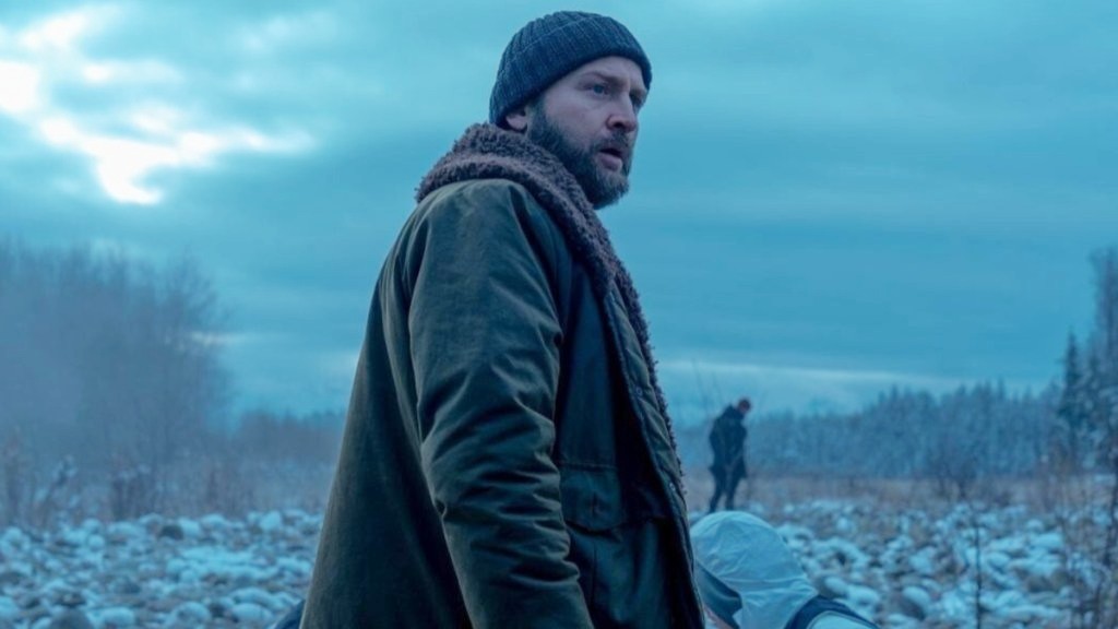 A man looks at a frozen landscape in Detective Forst.