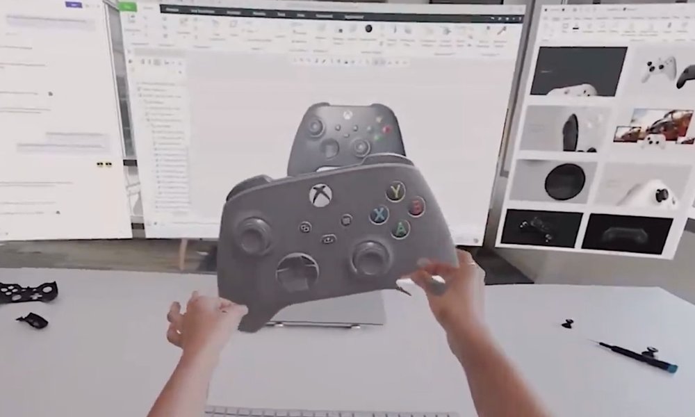 A person holds a virtual Xbox controller in VR.