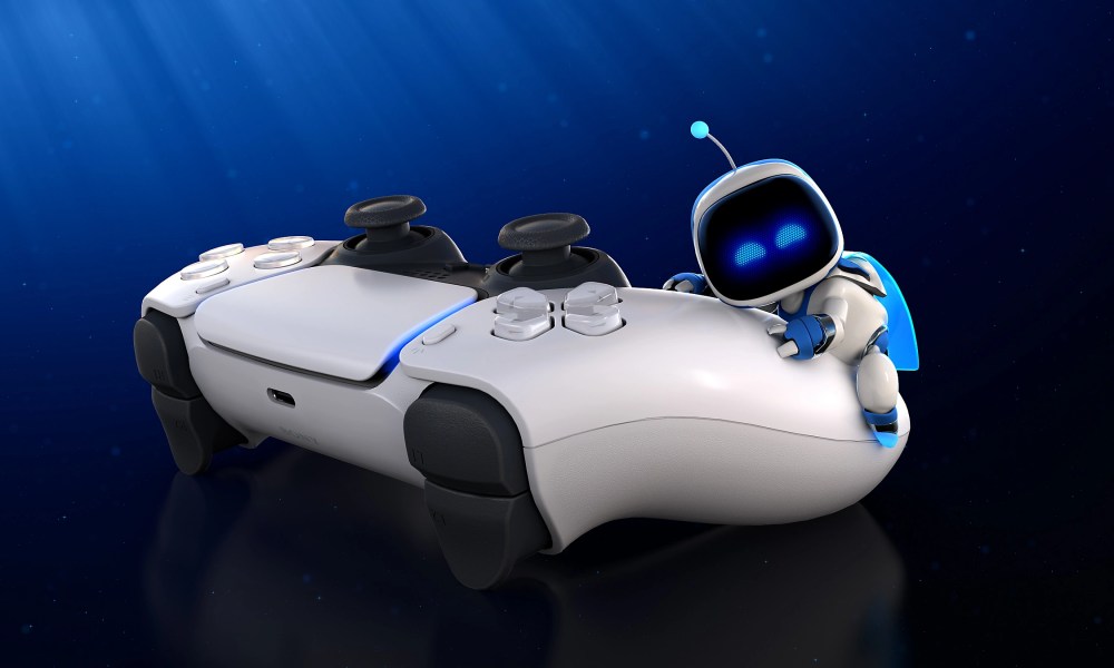 Astro Bot climbs on a DualSense controller.