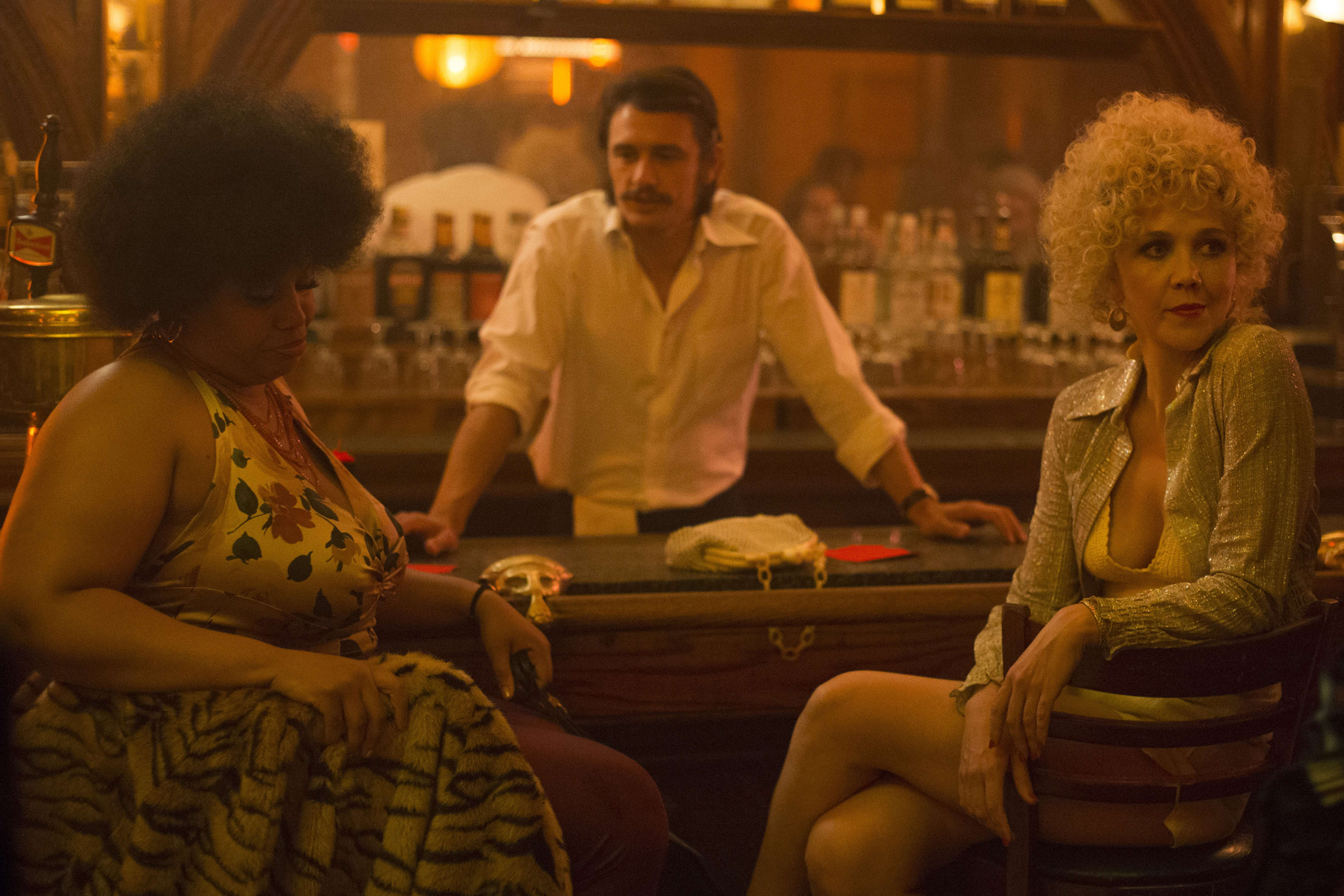 Candy sits at a bar in The Deuce.