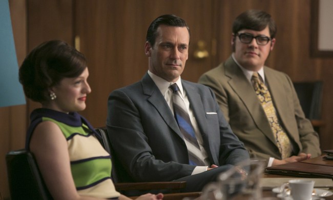 Don sits with Peggy and Harry in Mad Men.