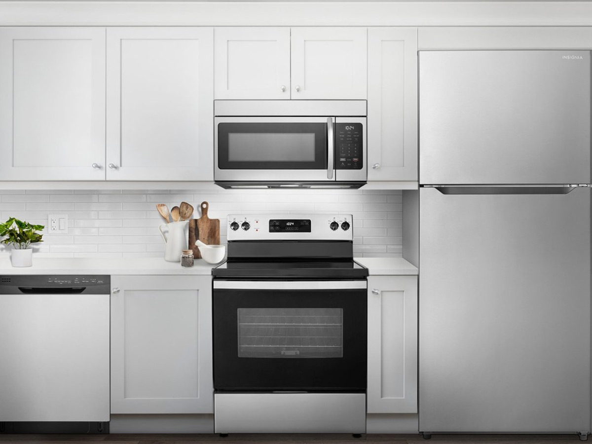 The Insignia 5 cu. ft. freestanding electric range installed in a kitchen.