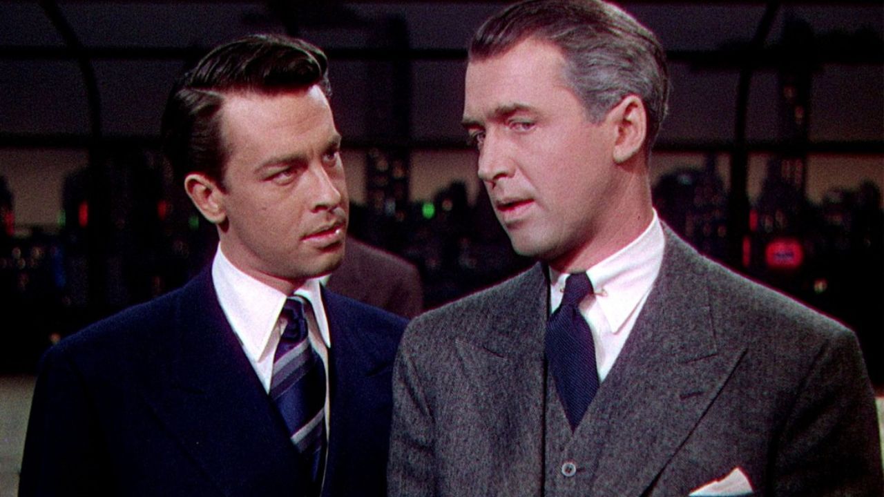 John Dall and James Stewart as Brandon and Rupert talking in Rope.