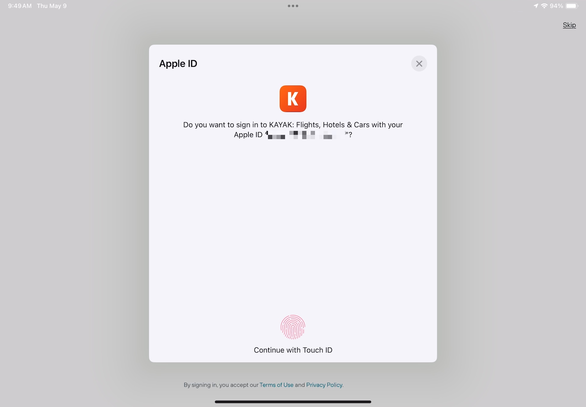 Passkey zum Anmelden mit Apple bei Kayak auf dem iPad.