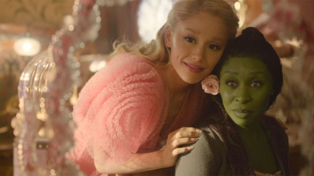 Ariana Grande hugs Cynthia Erivo in a still from the movie Wicked.