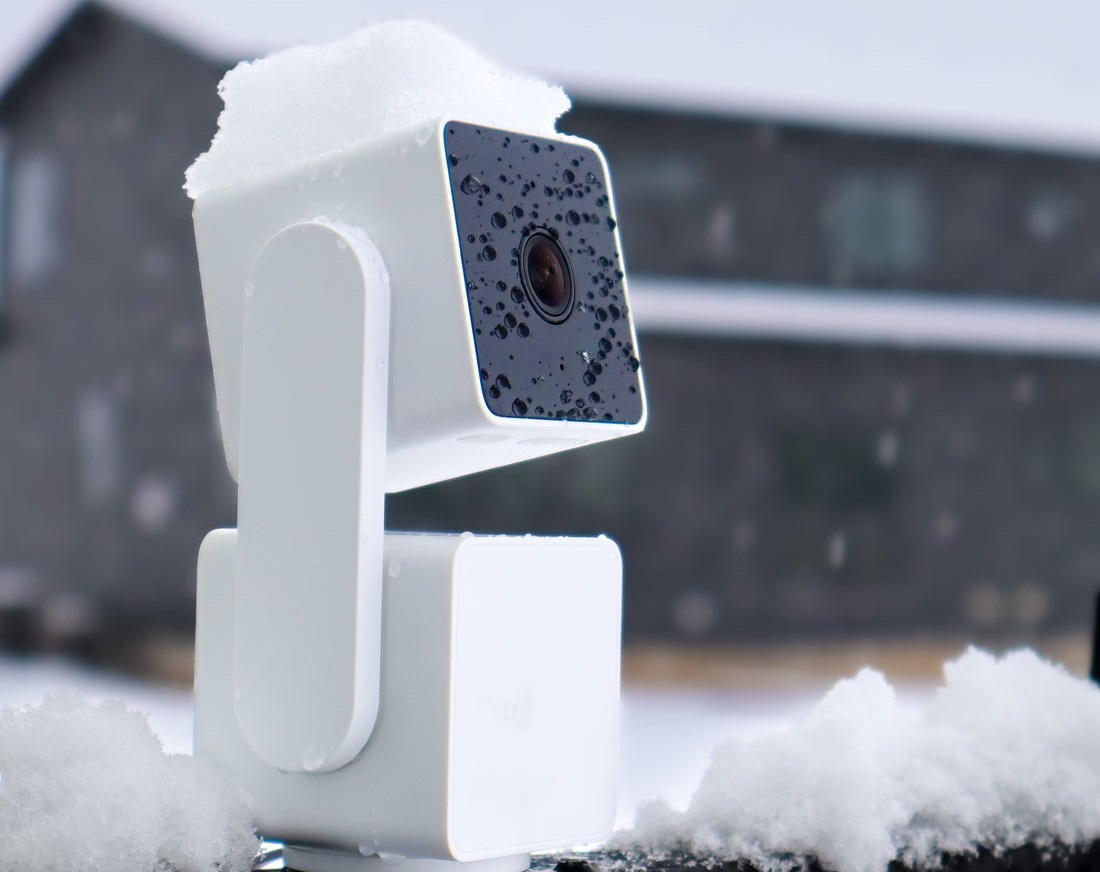 The Wyze Cam Pan v3 with ice on its frame.