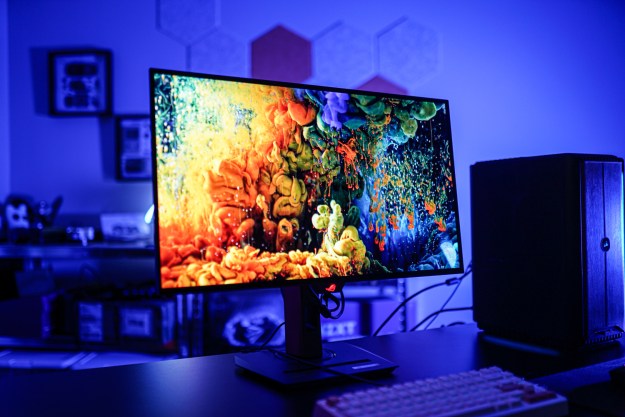 An Asus gaming monitor sitting on a table.