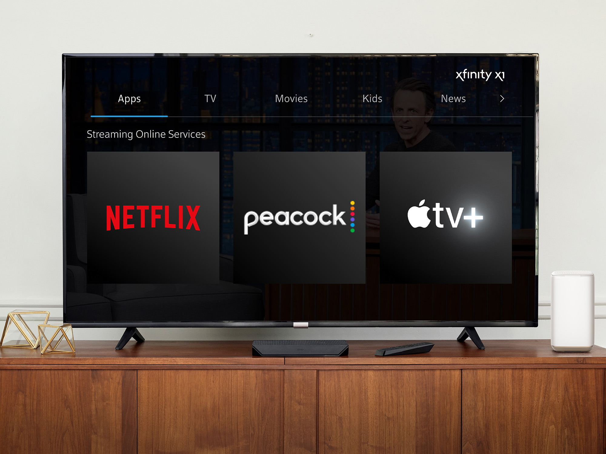 A handout image of a TV showing the logos of Netflix, Peacock, and Apple TV Plus.