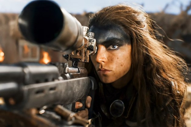 Furiosa aims her rifle in "Furiosa: A Mad Max Saga."